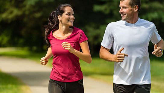 Husband and Wife out on a jog follow health advice from Lake Worth chiropractor