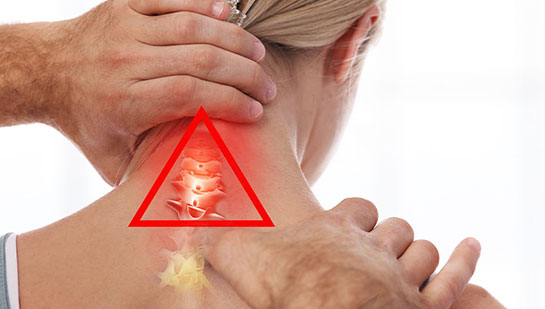 Lake Worth chiropractor adjusting woman's neck for whiplash