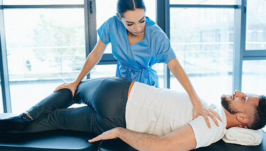Patient receiving sciatica treatment from Lake Worth chiropractor