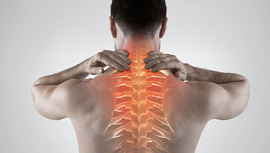 Man with upper back pain before chiropractic treatment from Lake Worth chiropractor